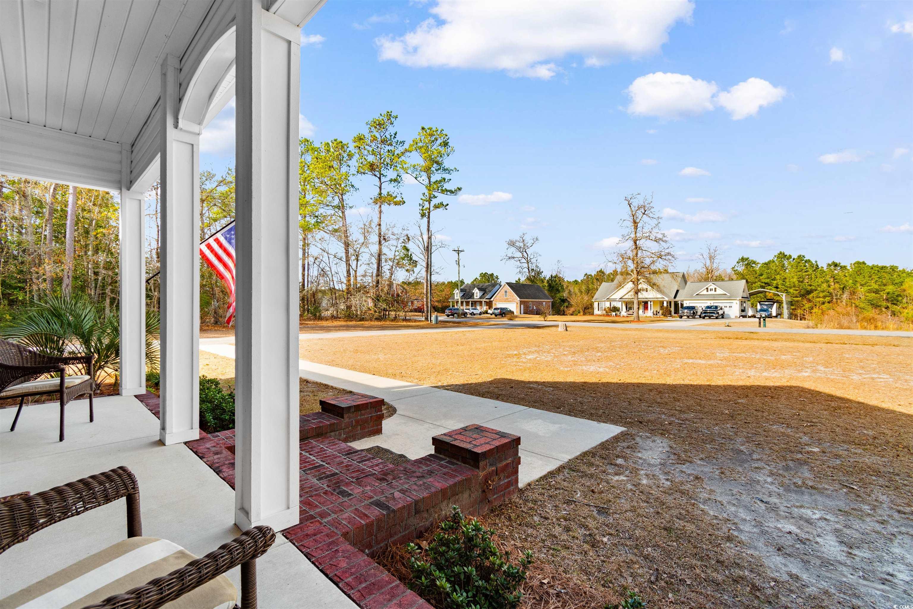 1291 Pisgah Church Road Aynor, SC 29511 - Photo 7 of 39 View of patio / terrace with covered porch
