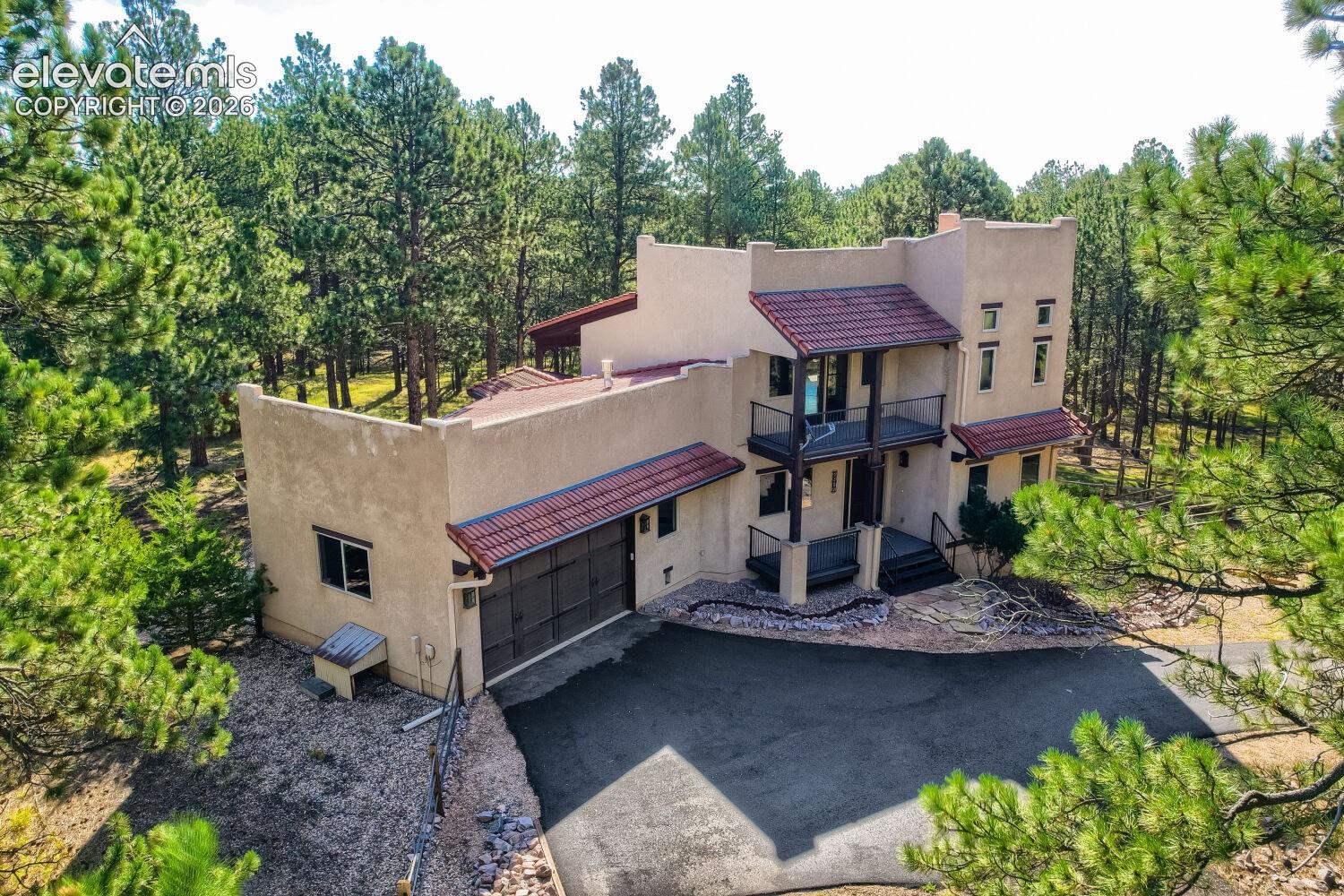 9890 Hardy Road Colorado Springs, CO 80908 - Photo 1 of 50 Soutwest inspired beauty