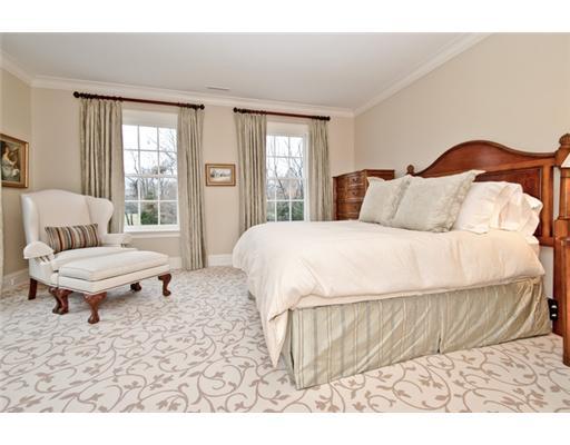 362 Brookside Road Darien, CT 06820 - Photo 19 of 20 a bedroom with a bed and wooden floor
