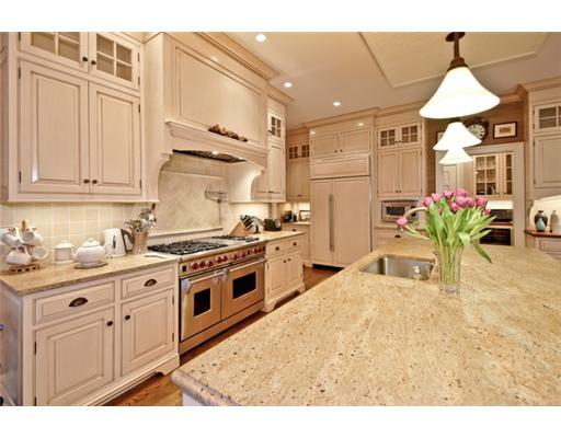 362 Brookside Road Darien, CT 06820 - Photo 9 of 20 a kitchen with stainless steel appliances kitchen island granite countertop a sink a stove and a refrigerator