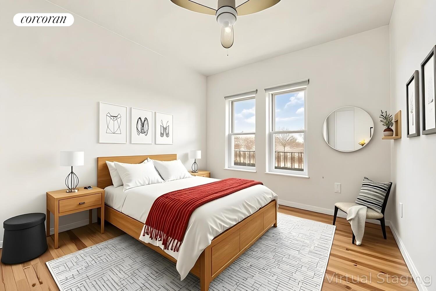 415 9th Street, Unit 51 Brooklyn, NY 11215 - Photo 3 of 6 a bedroom with a bed a mirror and a window