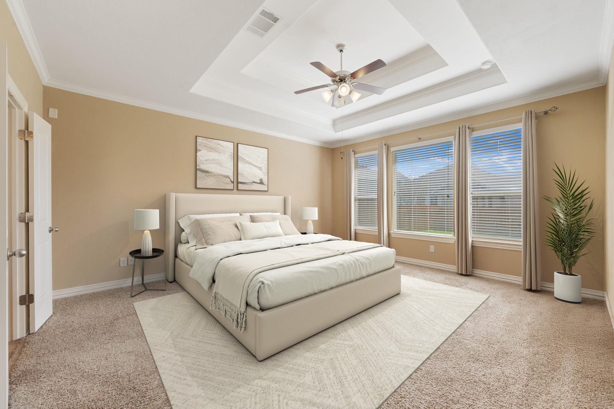 3904 Brean Down Road Pflugerville, TX 78660 - Photo 13 of 40 Bedroom featuring light carpet, ceiling fan, and crown molding