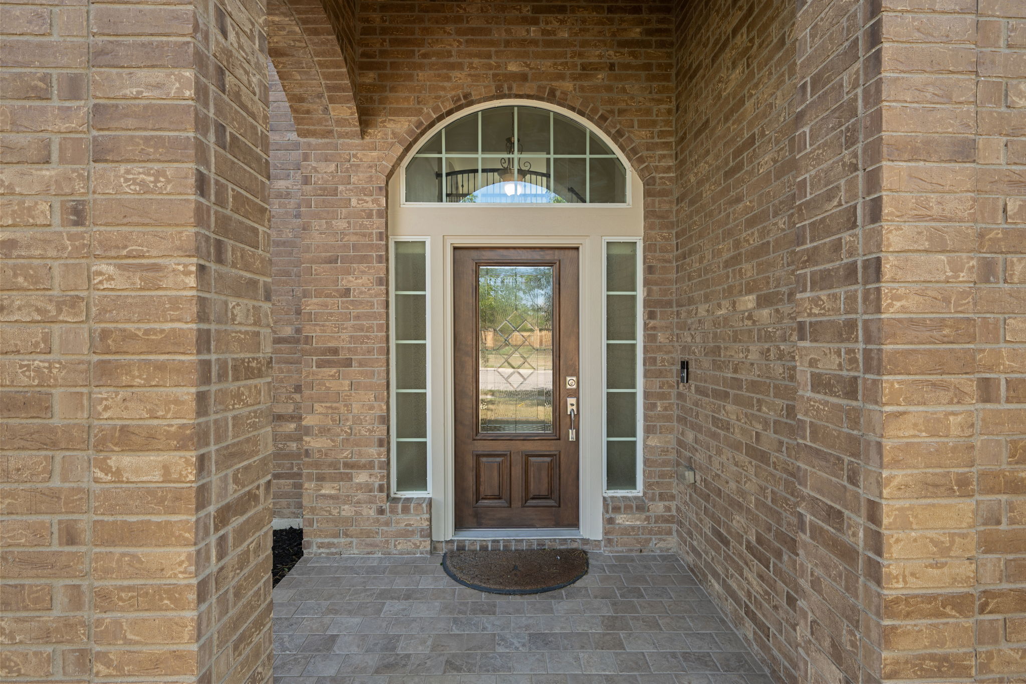 3904 Brean Down Road Pflugerville, TX 78660 - Photo 2 of 40 Doorway to property with brick siding