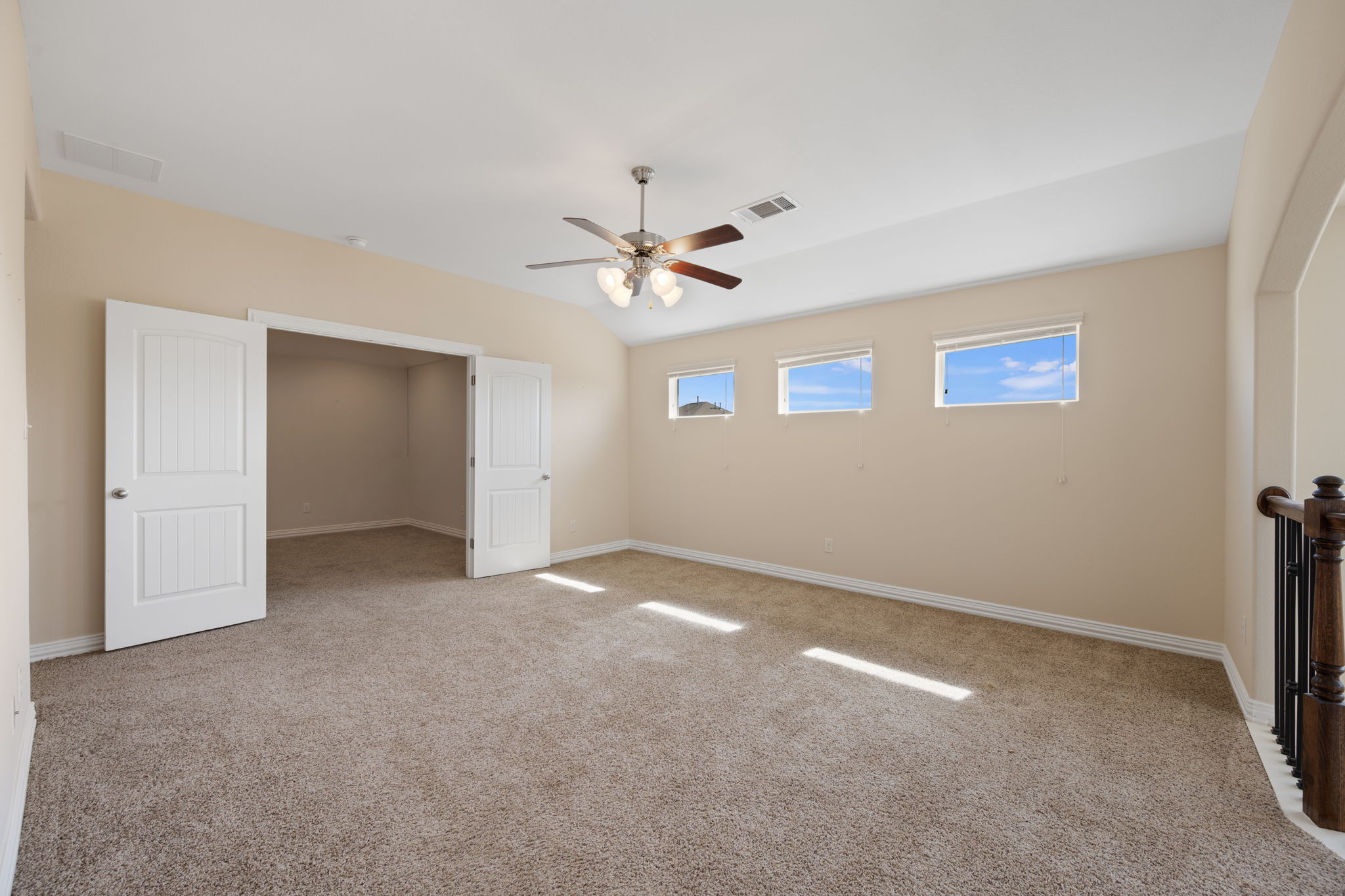 3904 Brean Down Road Pflugerville, TX 78660 - Photo 23 of 40 Unfurnished bedroom with light carpet and a ceiling fan