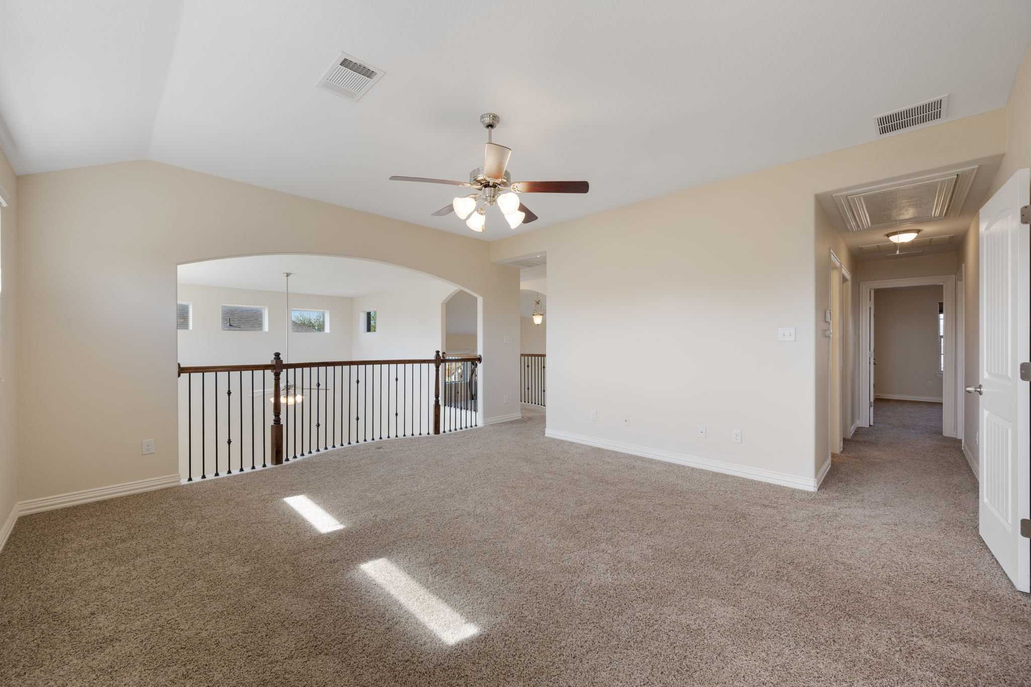 3904 Brean Down Road Pflugerville, TX 78660 - Photo 24 of 40 Spare room featuring carpet floors, a ceiling fan, and lofted ceiling