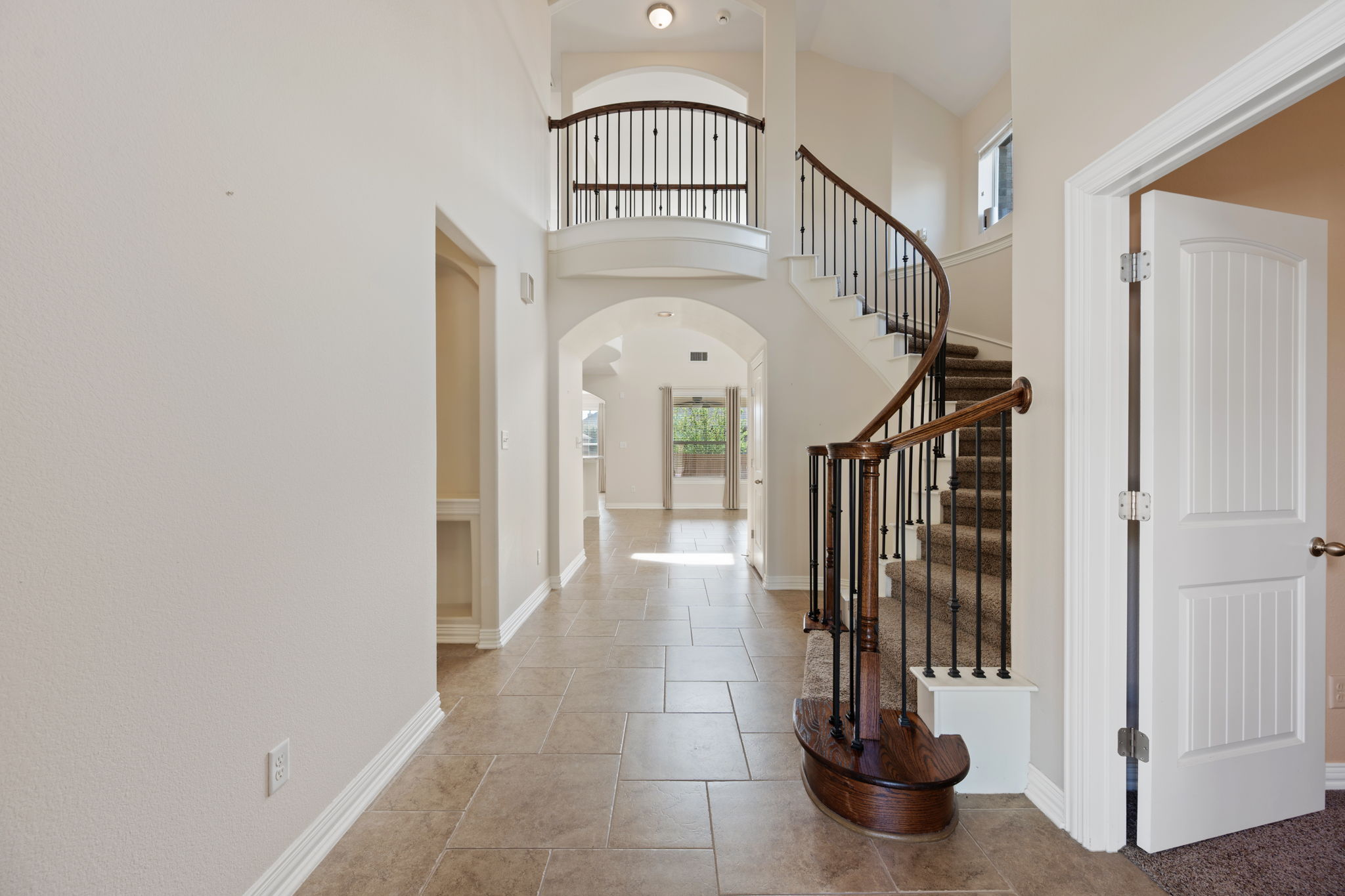 3904 Brean Down Road Pflugerville, TX 78660 - Photo 3 of 40 Foyer featuring arched walkways and a high ceiling