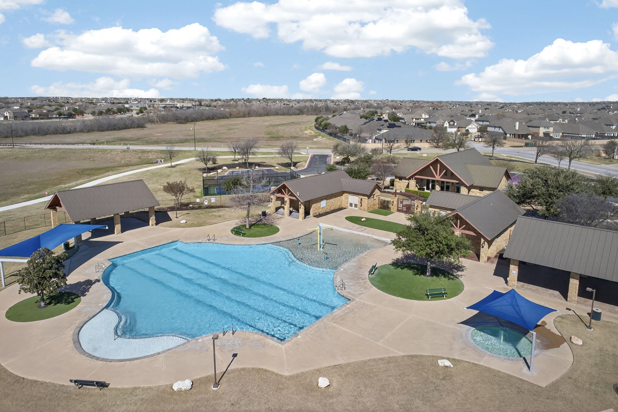 3904 Brean Down Road Pflugerville, TX 78660 - Photo 37 of 40 Community pool featuring a patio and a residential view