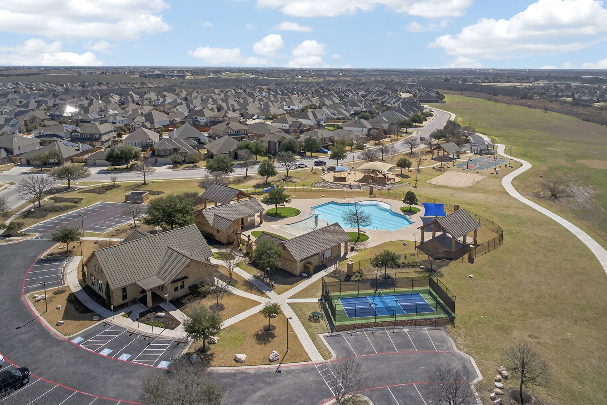 3904 Brean Down Road Pflugerville, TX 78660 - Photo 38 of 40 Aerial perspective of suburban area with a pool
