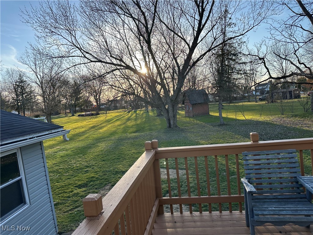 60 Taylor Road Barberton, OH 44203 - Photo 32 of 35 Wooden terrace with an outdoor structure and a lawn