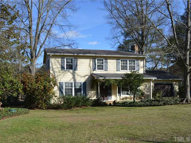 5301 Pelham Road Durham, NC 27713 - Photo 1 of 25 a front view of a house with a garden