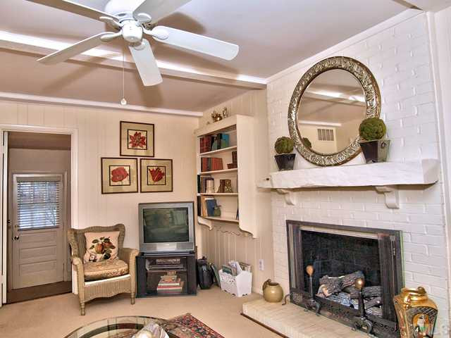 5301 Pelham Road Durham, NC 27713 - Photo 14 of 25 a living room with furniture and a fireplace