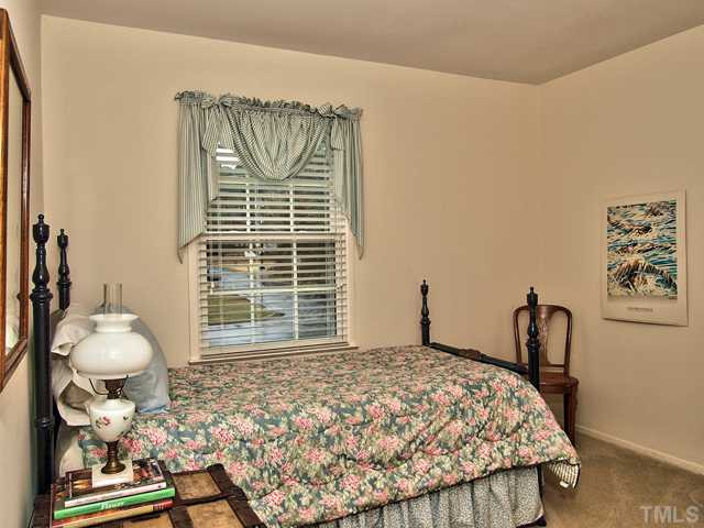 5301 Pelham Road Durham, NC 27713 - Photo 17 of 25 a bedroom with a bed and a window
