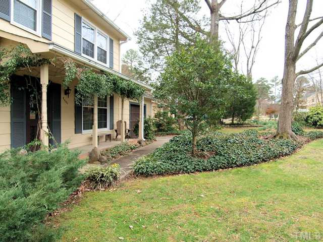 5301 Pelham Road Durham, NC 27713 - Photo 4 of 25 a front view of a house with a yard and porch