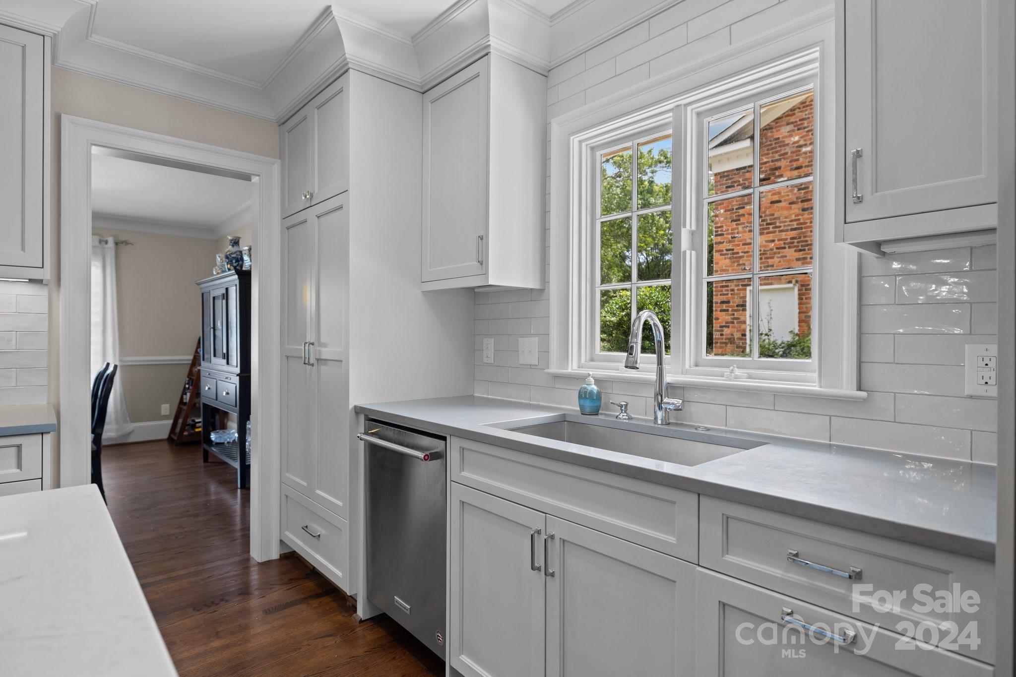 2414 Inverness Road Charlotte, NC 28209 - Photo 14 of 46 a kitchen with a sink and a window