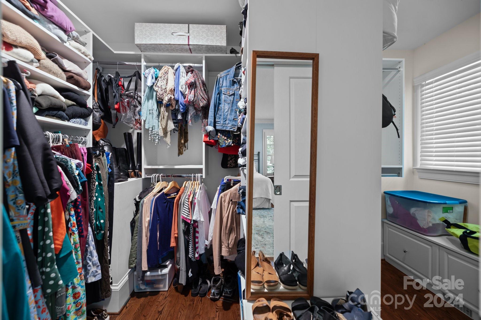 2414 Inverness Road Charlotte, NC 28209 - Photo 24 of 46 a view of walk in closet with clothes