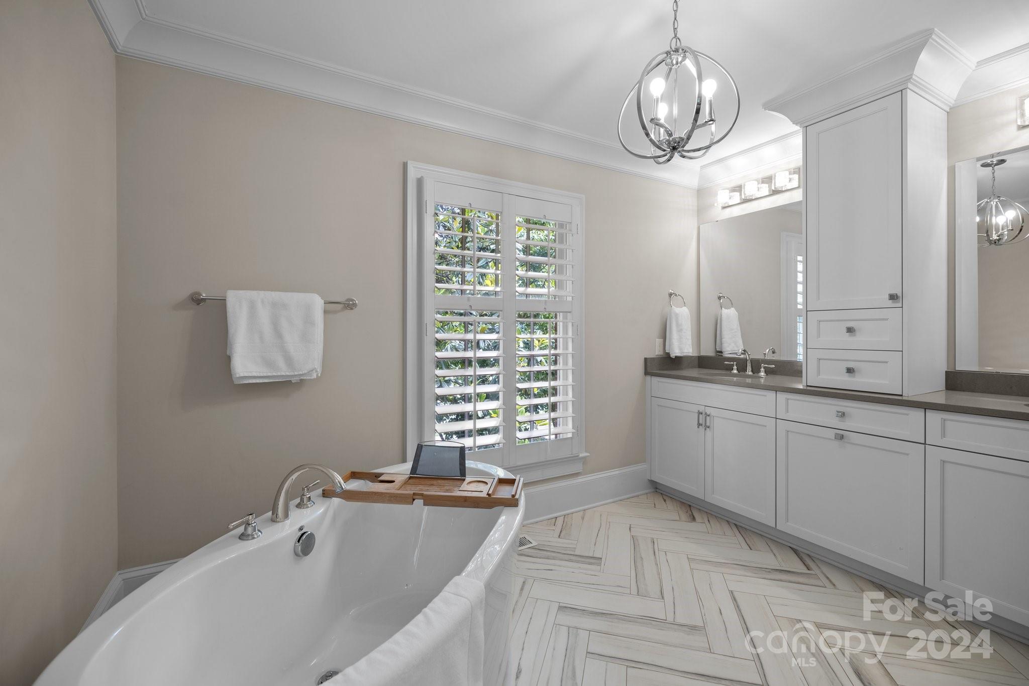 2414 Inverness Road Charlotte, NC 28209 - Photo 25 of 46 a large bathroom with double vanity and a window
