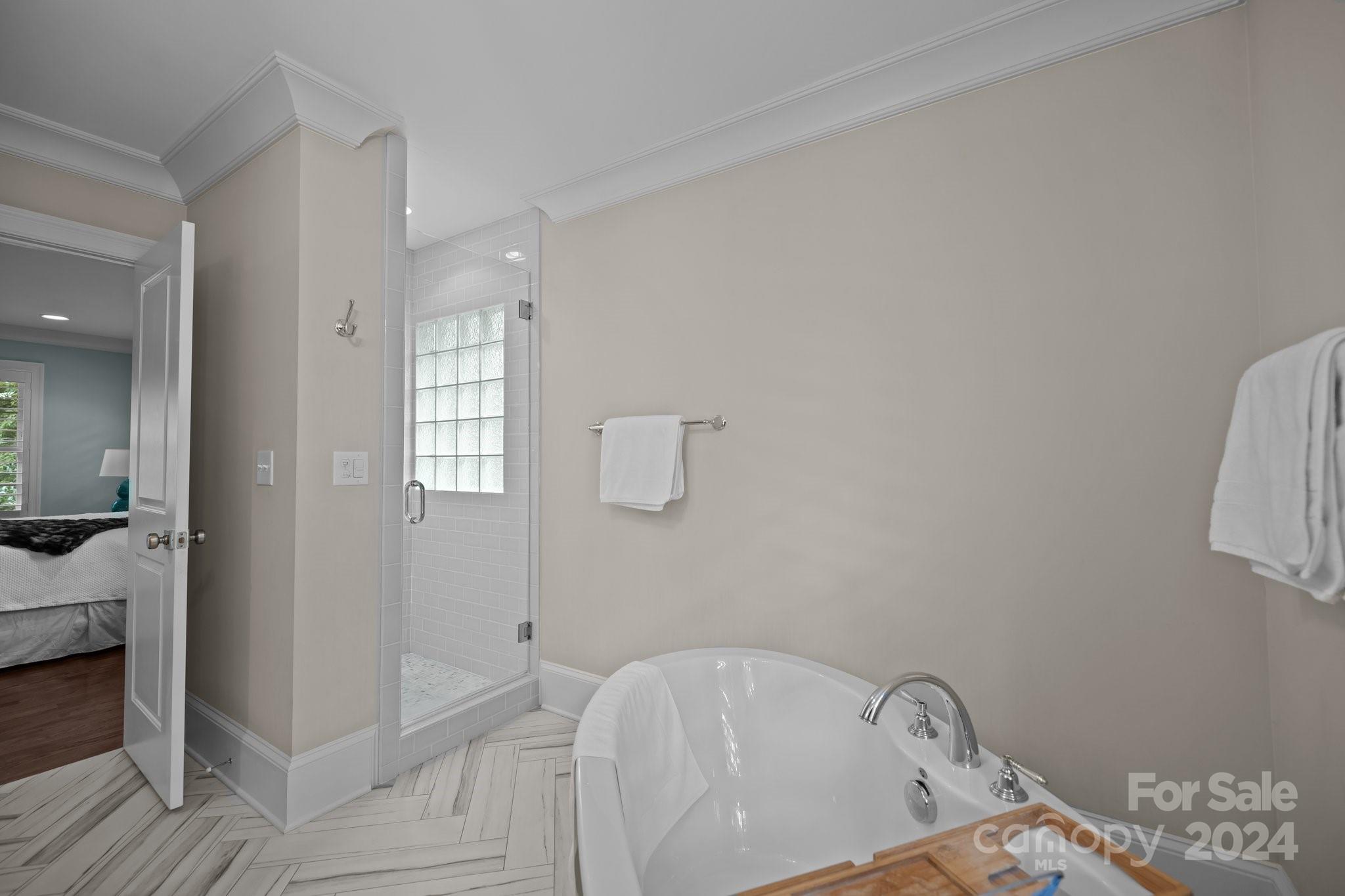 2414 Inverness Road Charlotte, NC 28209 - Photo 27 of 46 a bathroom with a bathtub and shower