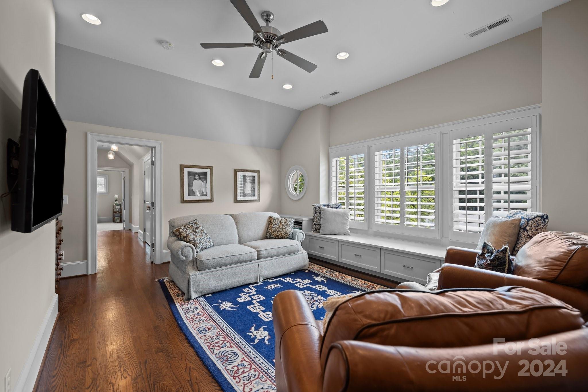 2414 Inverness Road Charlotte, NC 28209 - Photo 38 of 46 a living room with furniture and a large window