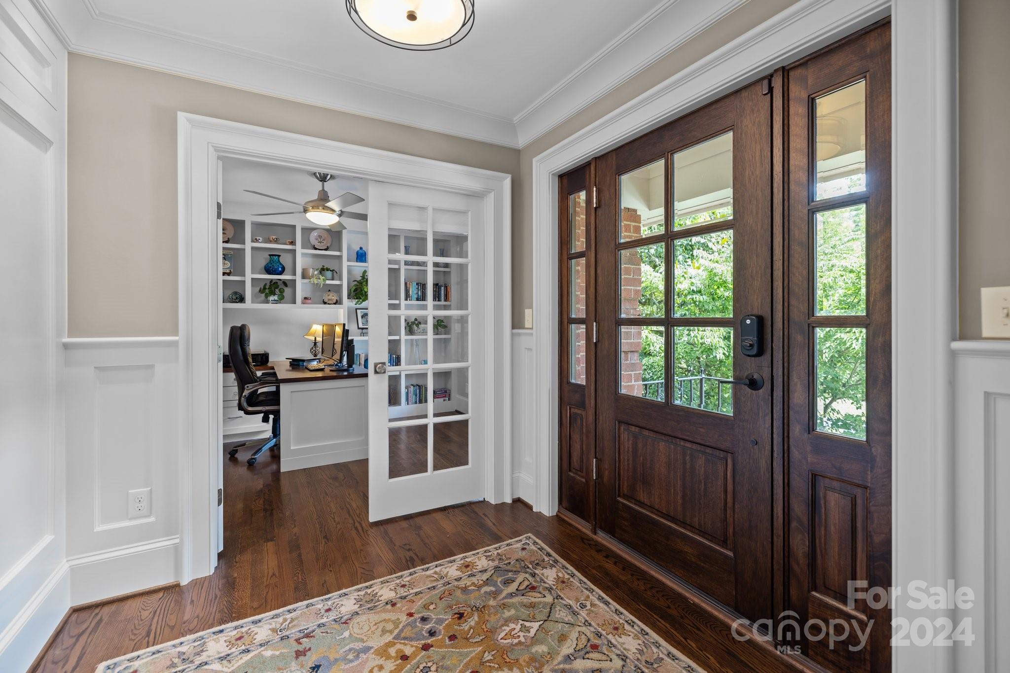 2414 Inverness Road Charlotte, NC 28209 - Photo 6 of 46 a view of a bedroom with wooden floor and a window