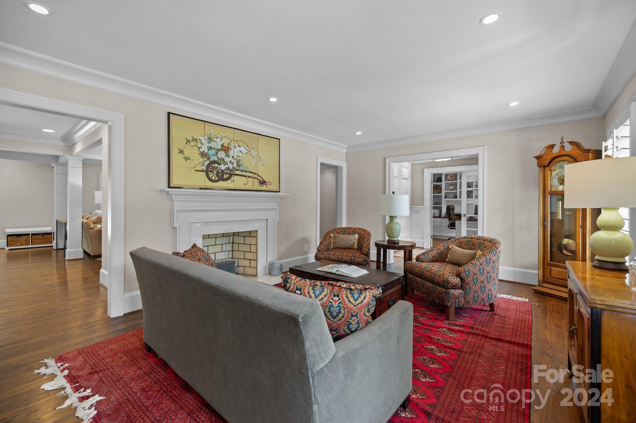 2414 Inverness Road Charlotte, NC 28209 - Photo 10 of 46 a living room with furniture and a fireplace