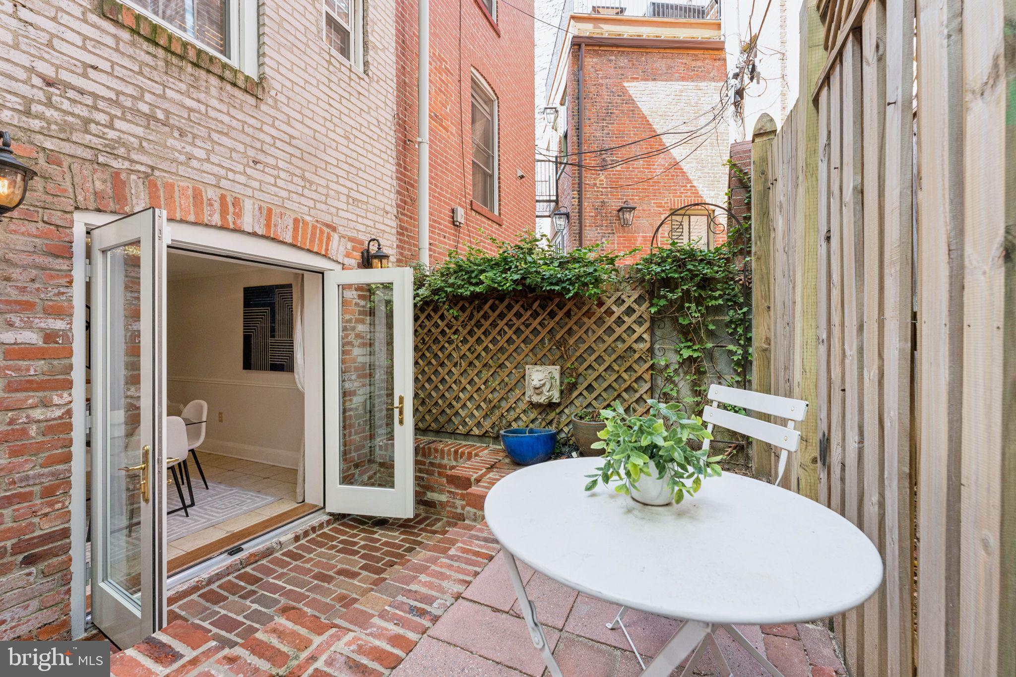 818 Independence Avenue Southeast Washington, DC 20003 - Photo 24 of 28 a view of a balcony with chairs and a potted plant