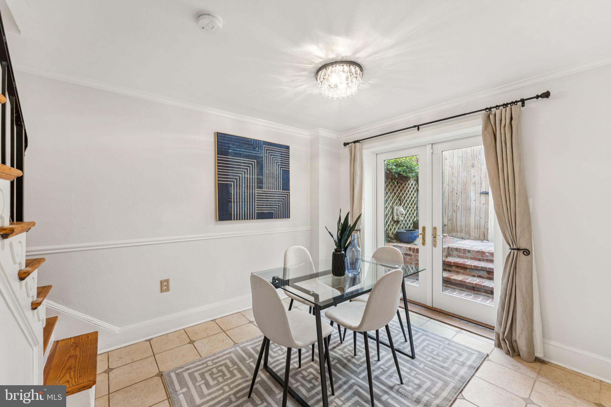 818 Independence Avenue Southeast Washington, DC 20003 - Photo 8 of 28 a dining room with furniture and wooden floor