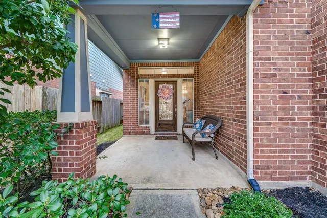 a bench sitting in front of a building