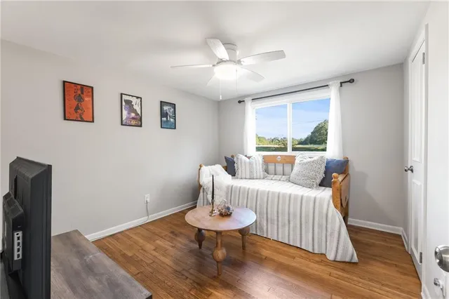 a room with furniture and a window