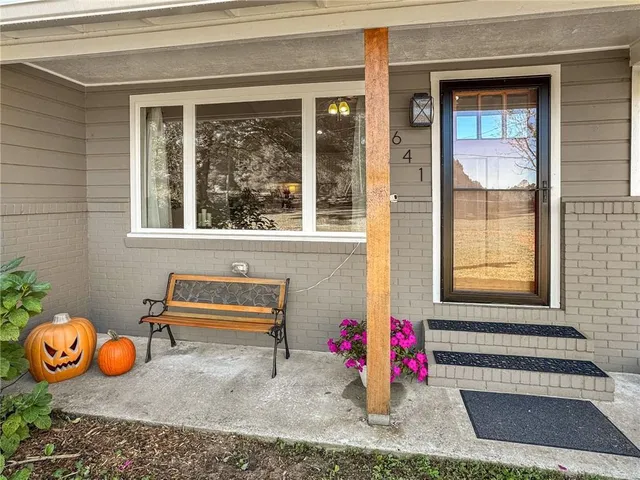 a front view of a house with outdoor space