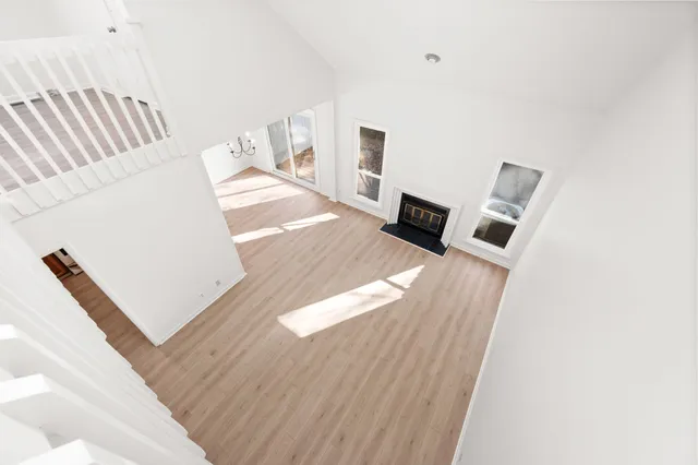 a view of living room with furniture and rug