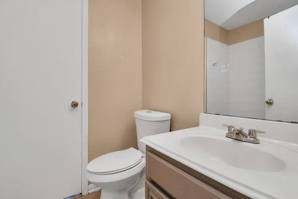 a bathroom with a sink and a toilet