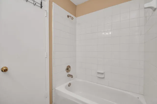 a bathroom with a bathtub