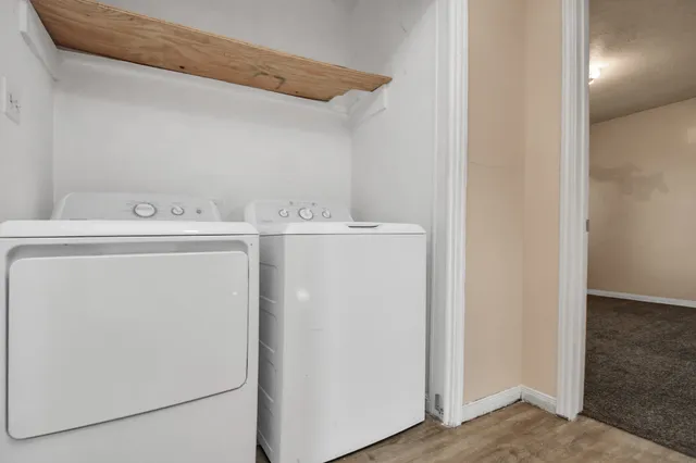 a utility room with dryer and washer