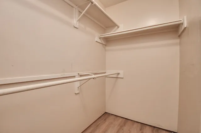 a view of a room with racks on the wall