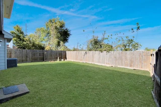 a view of a backyard with a garden