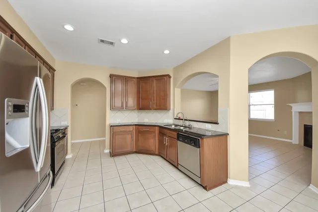 a dining room with furniture window and outside view
