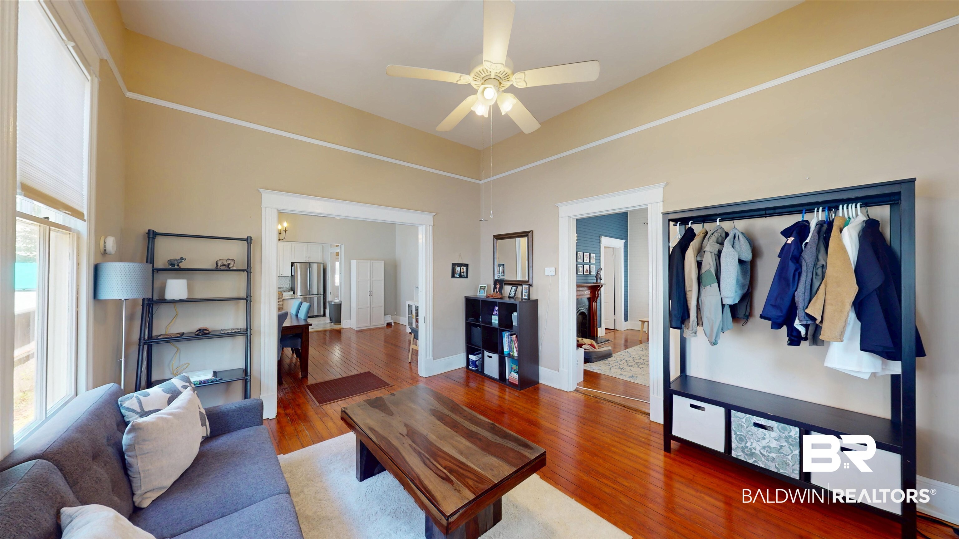 1154 New St Francis Street Mobile, AL 36604 - Photo 9 of 37 Living area featuring ceiling fan, baseboards, and wood finished floors