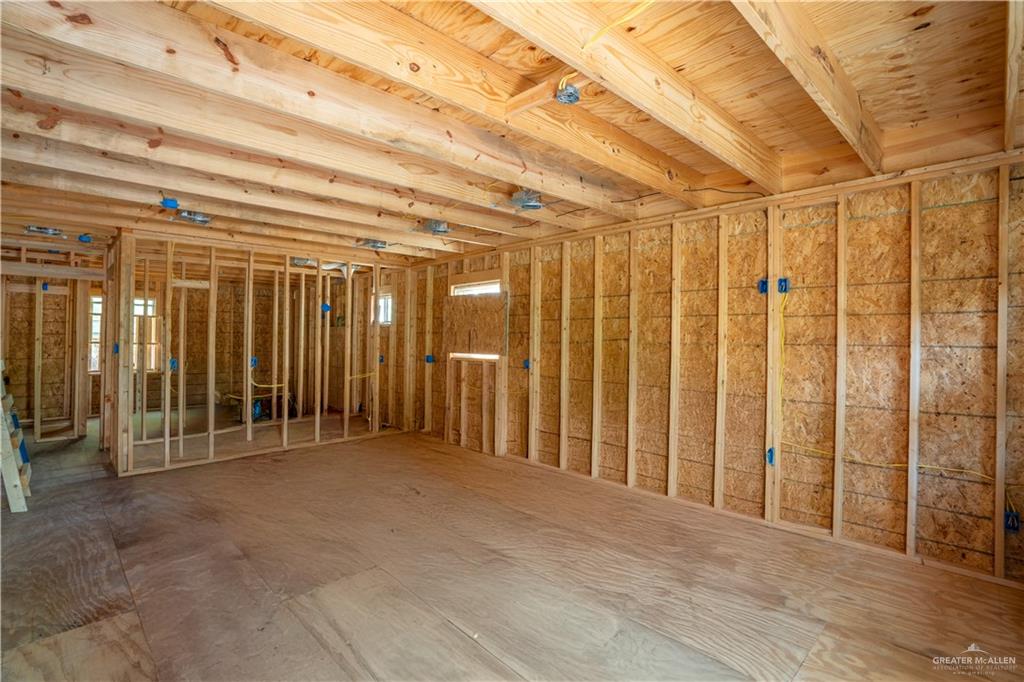 115 Guerra Avenue Weslaco, TX 78596 - Photo 5 of 17 a view of a room with wooden walls