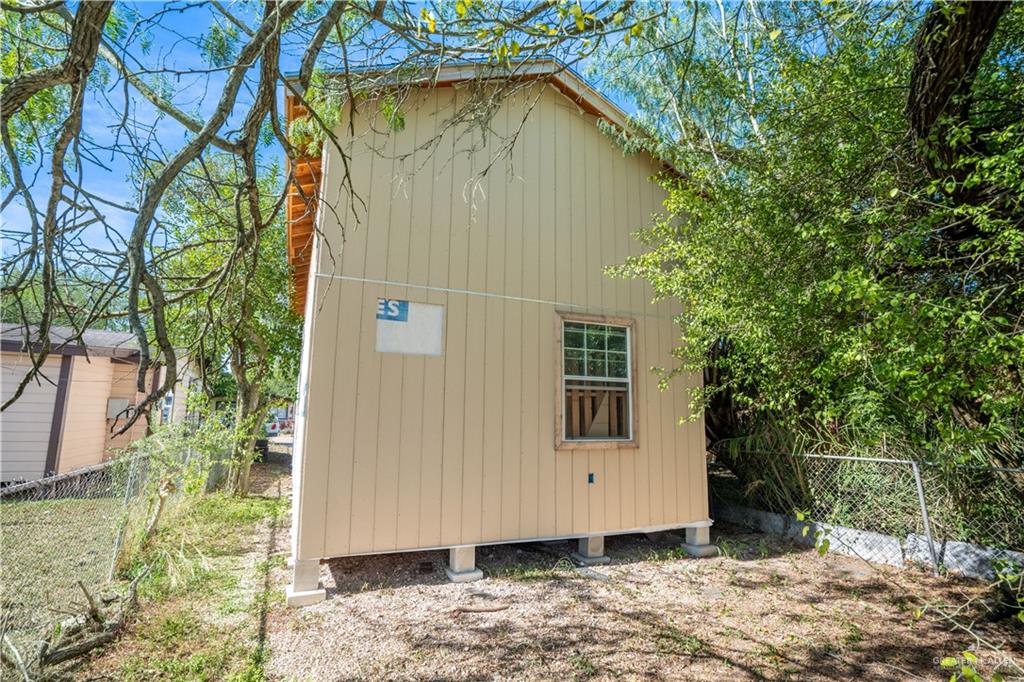 115 Guerra Avenue Weslaco, TX 78596 - Photo 9 of 17 a view of a house with backyard