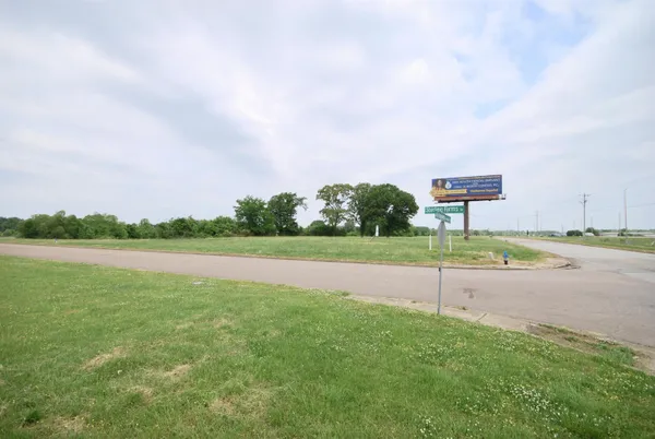 a view of a lake with a big yard