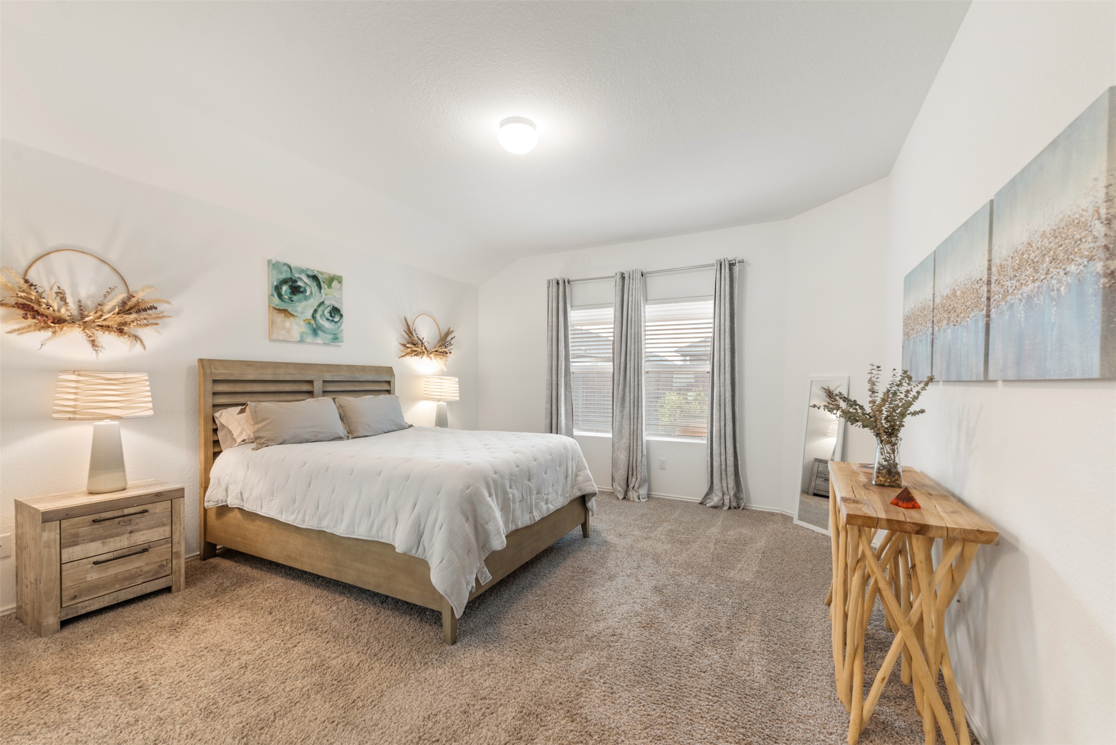230 Crystal River Road Kyle, TX 78640 - Photo 16 of 27 Large, Open, and private Primary Bedroom separate from the other bedrooms in the home.