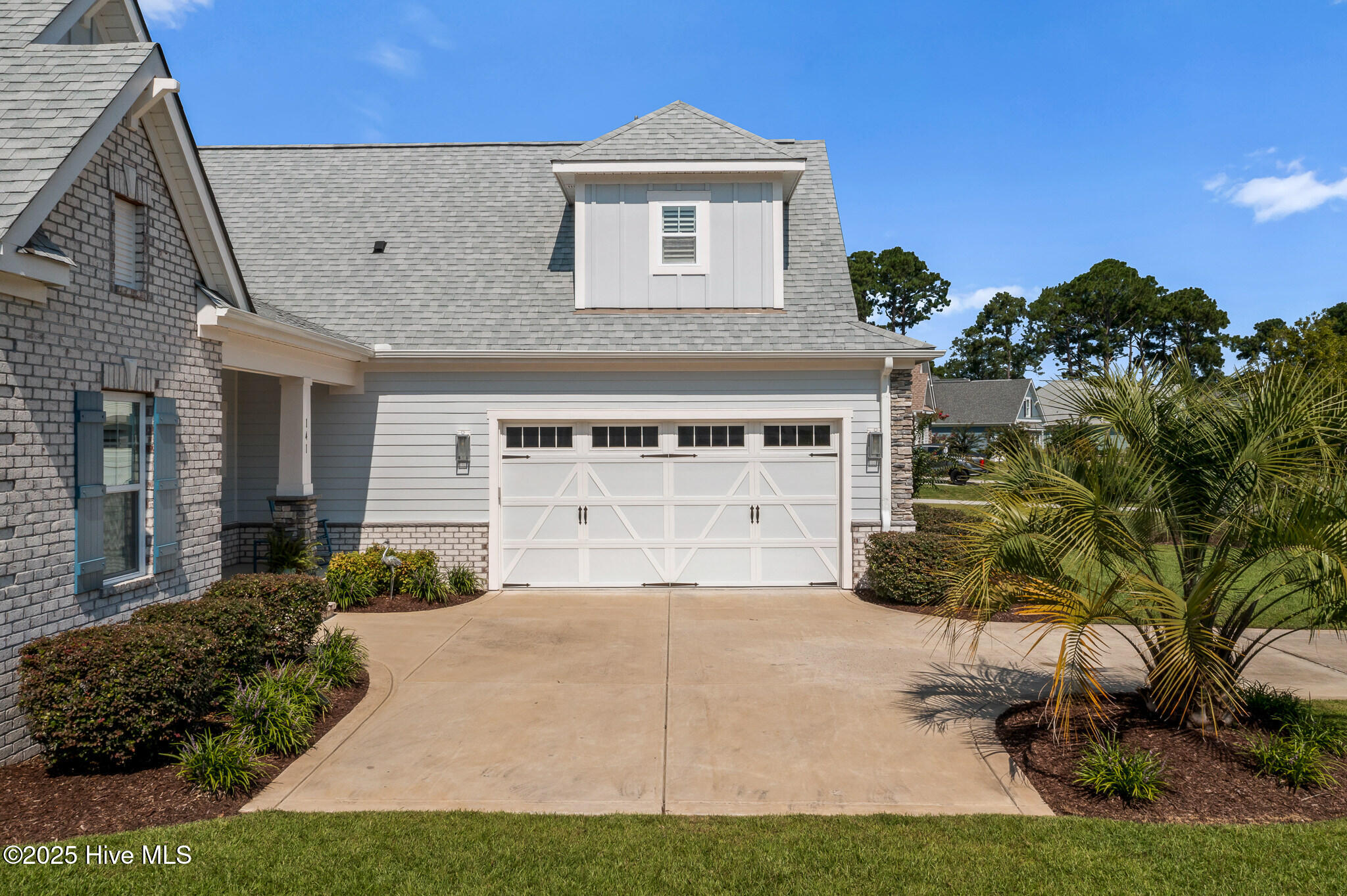 141 Clubhouse Road Sunset Beach, NC 28468 - Photo 4 of 59 Side Garage
