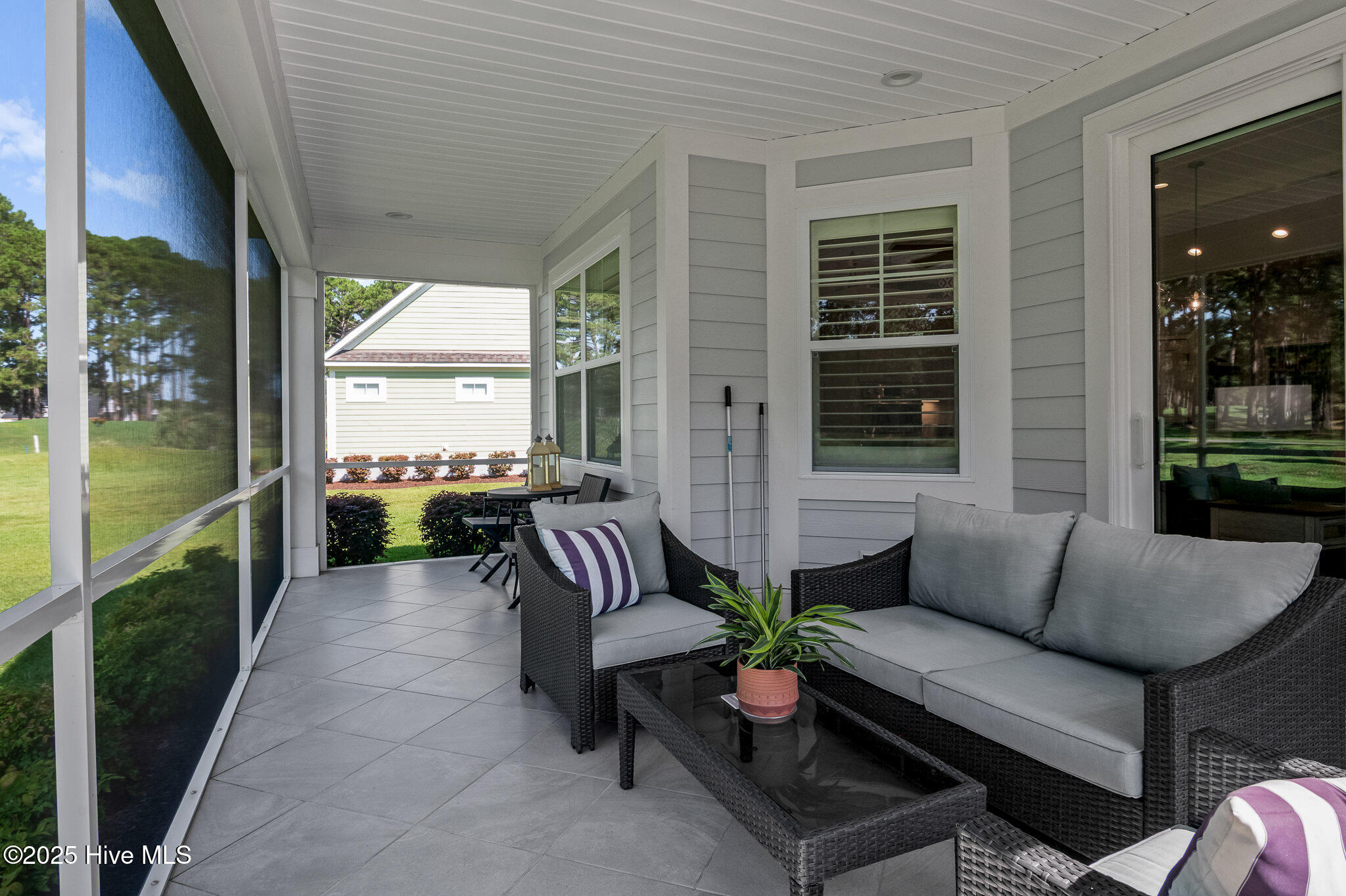 141 Clubhouse Road Sunset Beach, NC 28468 - Photo 43 of 59 Screened Porch