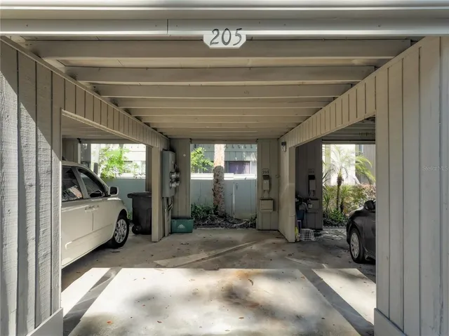 a view of a balcony with wooden stairs and stairs