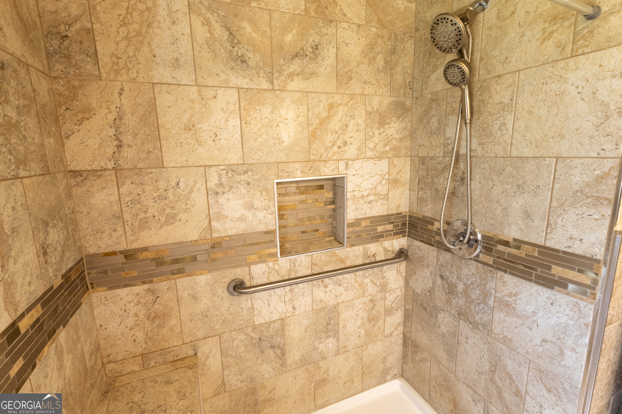 347 Peavy Street Unadilla, GA 31091 - Photo 12 of 15 a bathroom with a bathtub and shower