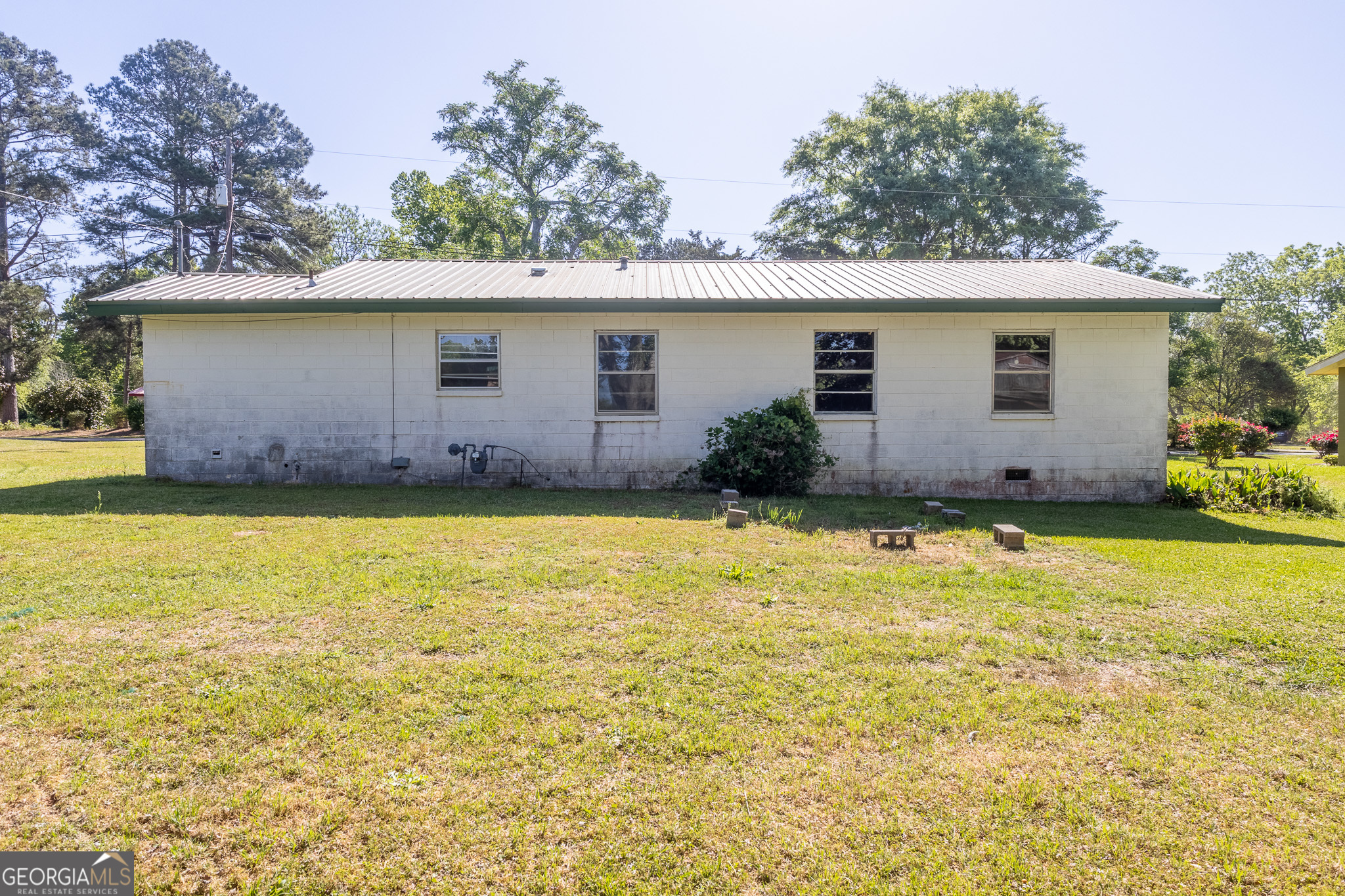 347 Peavy Street Unadilla, GA 31091 - Photo 13 of 15 a view of a backyard