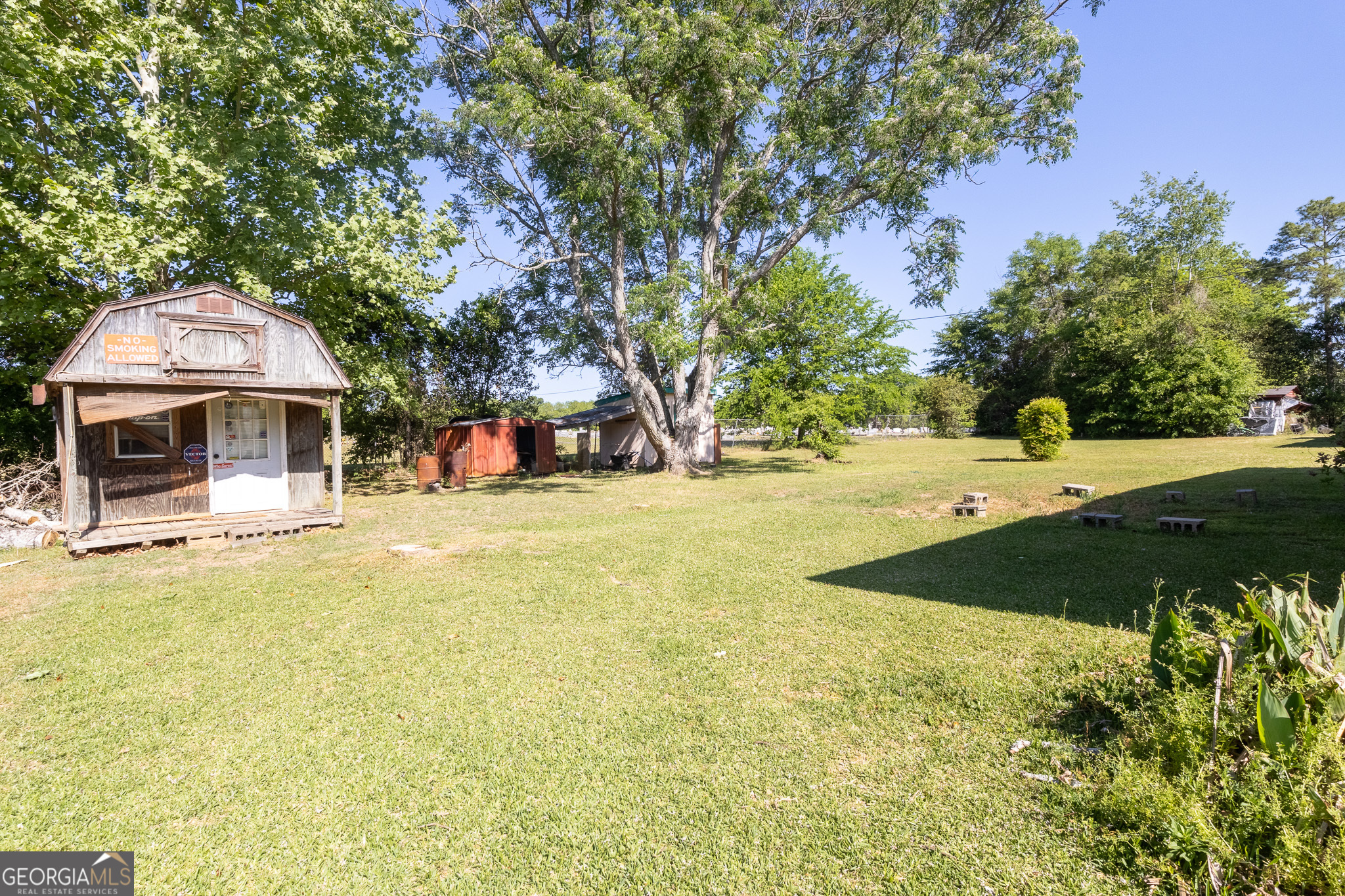 347 Peavy Street Unadilla, GA 31091 - Photo 15 of 15 a view of a swimming pool with an outdoor space