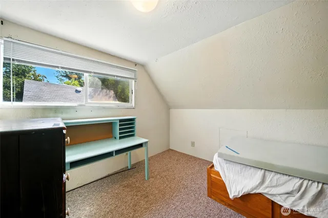 a view of hallway with washer and dryer