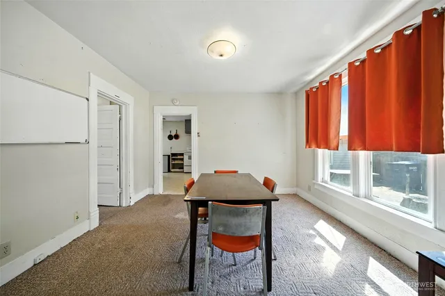 a room with furniture and a window