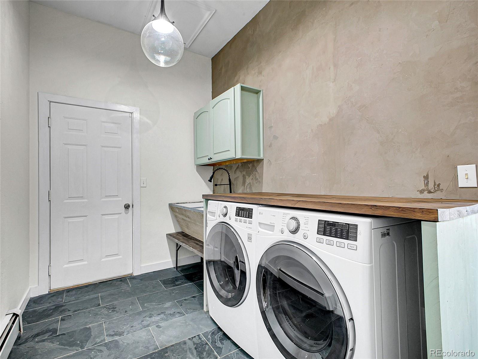 2635 Nova Road Pine, CO 80470 - Photo 25 of 45 a utility room with dryer and washer
